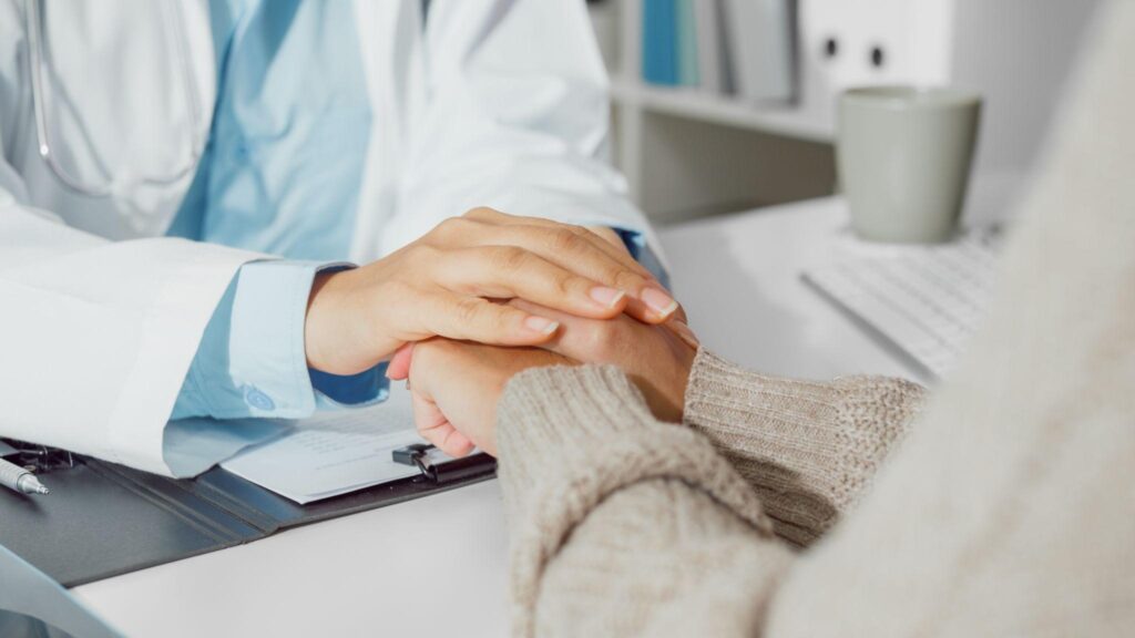 Doctor supporting a patient | Lifestyle Changes After Cancer